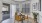 a dining room with a table and chairs